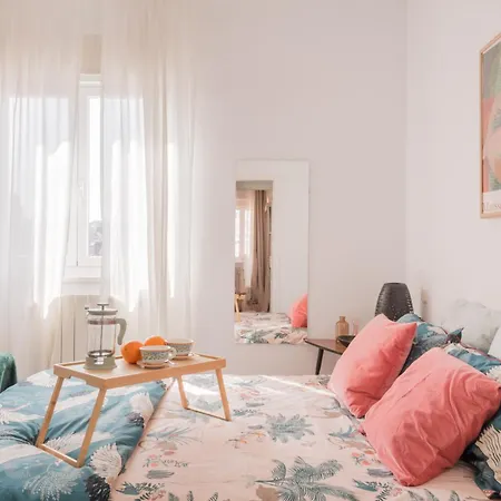 Cozy And Stylish With Natural Light And Vibrant Decor Madrid
