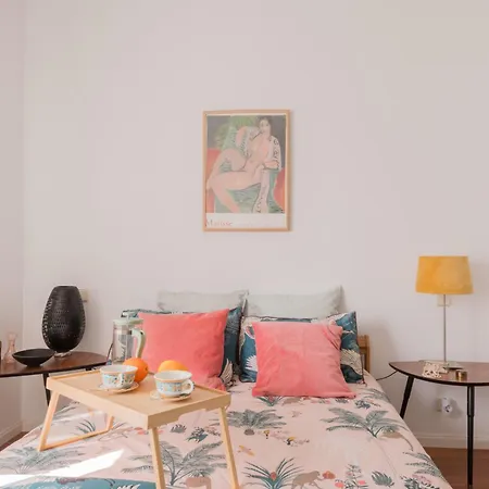 Cozy And Stylish With Natural Light And Vibrant Decor