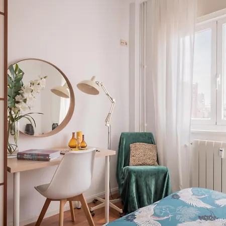 Cozy And Stylish With Natural Light And Vibrant Decor Madrid