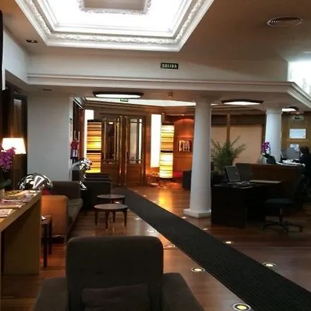 Hotel Quatro Puerta Del Sol 4*