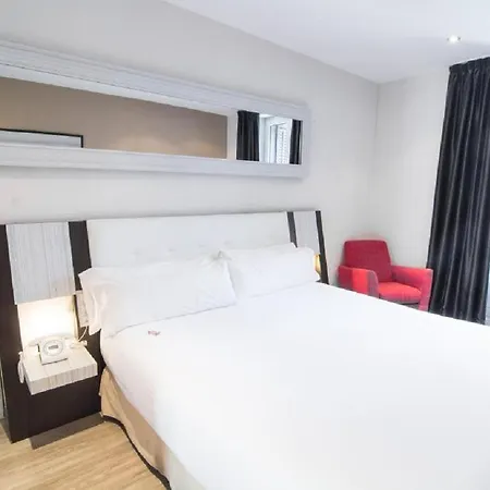 Petit Palace Arenal Отель